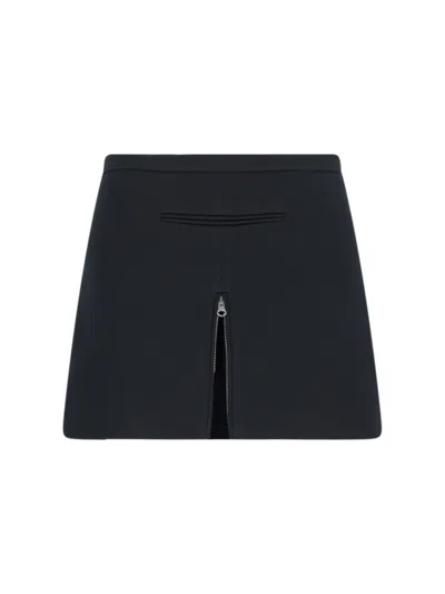 COURRÈGES ZIP MINI SKIRT IN BLACK FABRIC