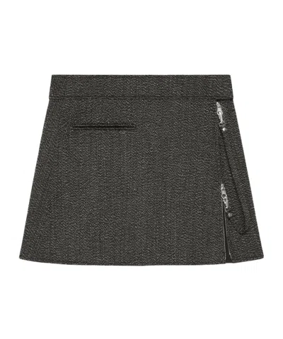 COURRÈGES ZIPPERED TWEED MINI SKIRT