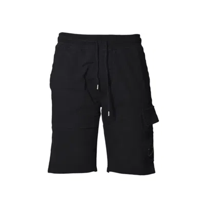 C.P. COMPANY BERMUDA CARGO LENS IN BLACK COTTON FLEECE