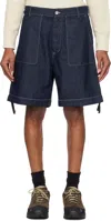 C.p. Company Dark Blue Shorts With Logo Patch On The Back In Denim Man In Denim