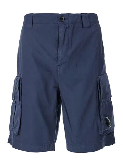 C.P. COMPANY BLUE BERMUDA PANTS WITH BELT LOOPS AND TWO MAXI PATCH POCKETS ON THE SIDE IN COTTON MAN