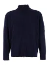 C.p. Company Blue Jacket With High Neck And Logo Plaque On The Sleeve In Wool Blend Man In Blue