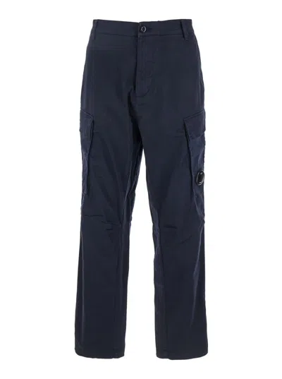 C.P. COMPANY BLUE PANTS WITH CARGO POCKETS AND LENS MOTIF ON THE LEG IN COTTON MAN