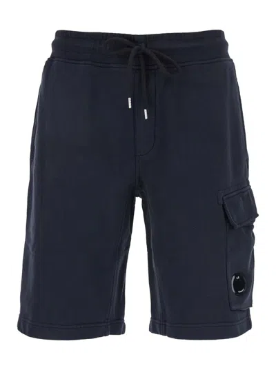 C.P. COMPANY BLUE SHORTS WITH LENS MOTIF ON THE LEG IN COTTON MAN