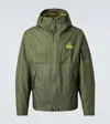 C.p. Company Logo-print Reversible Down Jacket In Grün