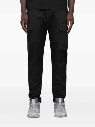 C.p. Company Hose Mit Aufgesetzten Taschen In Black