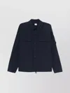 C.p. Company Blue Jacket With Classic Collar And Logo Patch On The Sleeve In Cotton Man