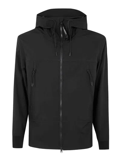 C.p. Company Goggle Jacket With Adjustable Hood And Multi-pocket Design In Black