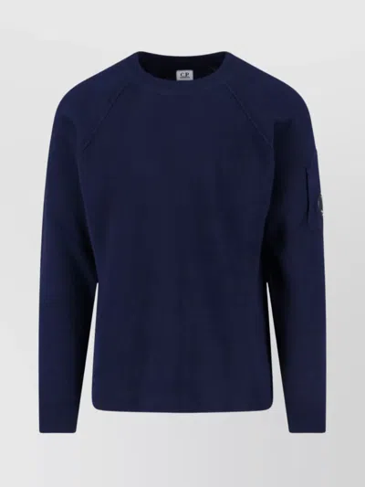C.p. Company Crewneck Sweater With Arm Pocket And Raglan Sleeves In Blue