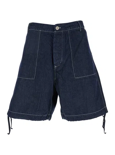 C.p. Company Dark Blue Shorts With Logo Patch On The Back In Denim Man