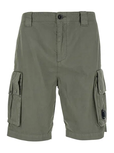 C.P. COMPANY GREEN BERMUDA PANTS WITH BELT LOOPS AND TWO MAXI PATCH POCKETS ON THE SIDE