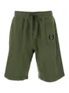 C.p. Company Green Shorts With Elastic Drawstring Waist And Logo Plaque On The Front In Green