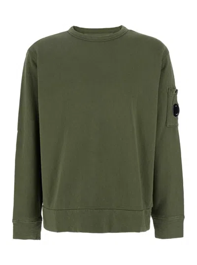 C.P. COMPANY GREEN CREWNECK SWEATSHIRT WITH LENS MOTIF ON THE SLEEVE IN COTTON MAN