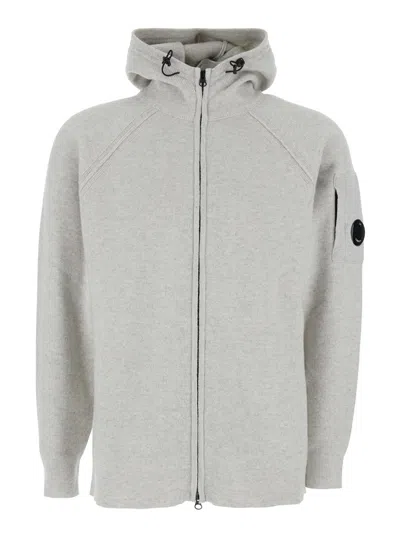 C.P. COMPANY GREY CARDIGAN WITH DRAWSTRING HOOD AND LOGO PLAQUE ON THE SLEEVE IN WOOL BLEND MAN