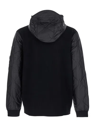 C.P. COMPANY BLACK JACKET WITH DRAWSTRING HOOD AND LOGO PLAQUE ON THE SLEEVE IN WOOL MAN