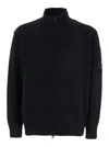 C.p. Company Black Jacket With High Neck And Logo Plaque On The Sleeve In Wool Blend Man In Black