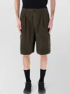 C.p. Company C.p.company Bermuda Cargo Sateen Stretch In Green