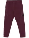 C.p. Company Lens Fleece Track Pants In Purple