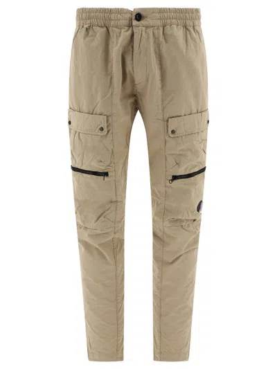 C.p. Company Lens Patch Cargo Trousers In Beige
