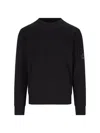 C.p. Company Long-sleeve Crewneck Sweatshirt With Zippered Pocket And Circular Logo Patch In Black