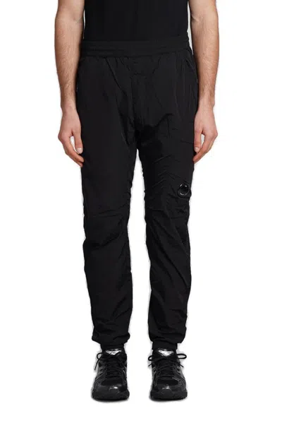 C.p. Company Logo Patch Tapered Cargo Trousers In Black