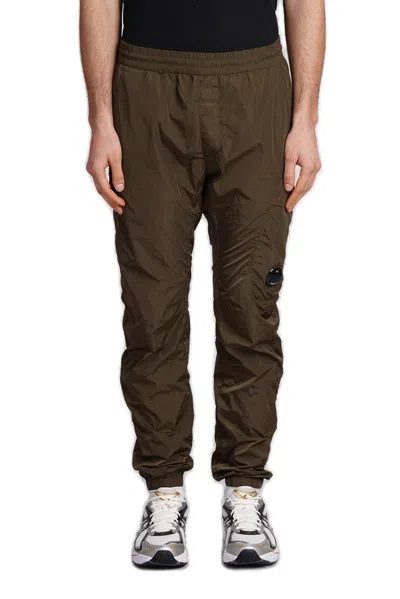 C.p. Company Logo Patch Tapered Cargo Pants In Green