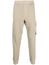 C.p. Company Logo-plaque Cotton Track Pants In Neutrals