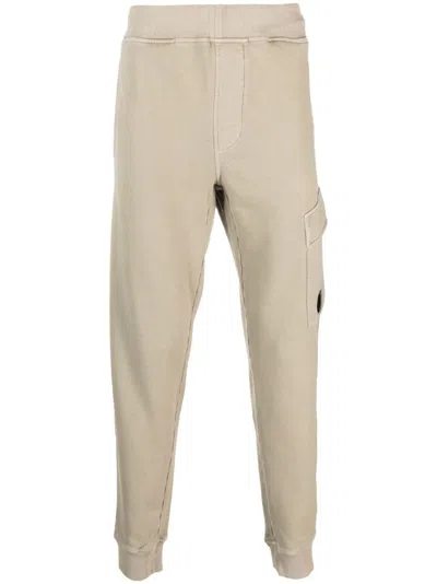 C.p. Company Logo-plaque Cotton Track Pants In Neutrals