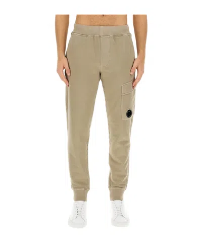 C.p. Company Logo-plaque Cotton Track Pants In Nude
