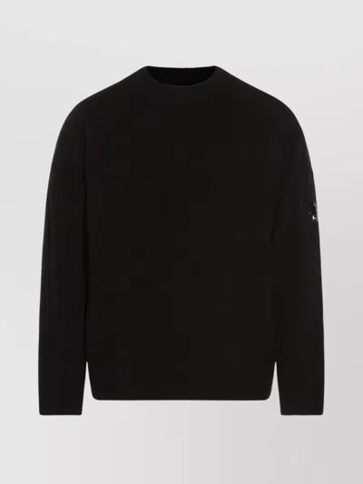C.P. COMPANY LONG SLEEVE CREW NECK SWEATER WITH ARM PATCHES