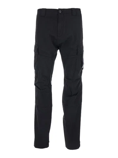 C.p. Company Men Black Cargo Pants With Two Cargo Pockets On The Front And Logo Plaque On The Side I