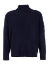 C.p. Company Blue Jacket With High Neck And Logo Plaque On The Sleeve In Wool Blend Man In Blue