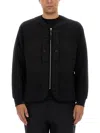 C.p. Company Minimalist Long-sleeve Top With Quilted Texture And Zipper Detail In Black