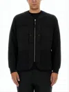 C.p. Company Minimalist Long-sleeve Top With Quilted Texture And Zipper Detail In Black