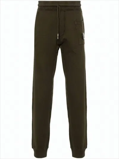 C.p. Company Relaxed Fit Brown Jogger Pants With Lens Detail In Black