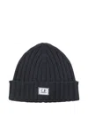 C.p. Company Ribbed Logo-plaque Beanie In Black