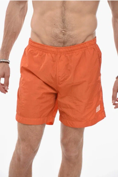 C.p. Company Solid Color Swim Shorts With Contrasting Logo In Orange