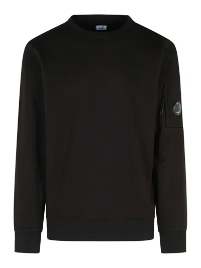 C.p. Company Long-sleeve Crewneck Sweatshirt With Zippered Pocket And Circular Logo Patch In Black