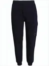 C.p. Company Tapered Jogger Pants With Ribbed Cuffs And Cargo Pocket In Black