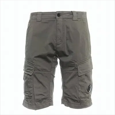C.P. COMPANY UTILITARIAN SHORTS WITH FLAP POCKETS AND SIGNATURE LENS DETAIL