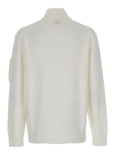 C.P. COMPANY WHITE CARDIGAN WITH HIGH NECK AND LENS MOTIF APPLIED ON THE SLEEVE IN COTTON MAN