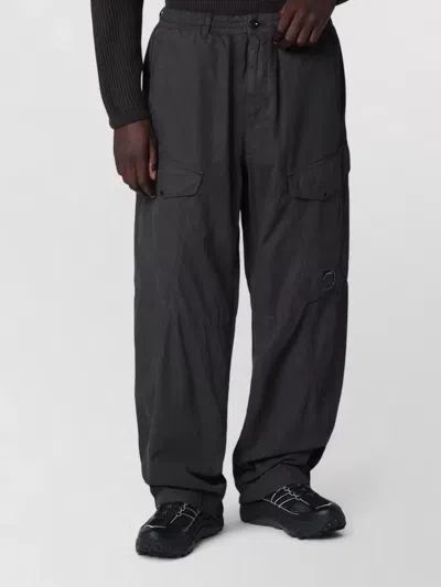 C.p. Company Wide Leg Cargo Pants Button Detail In Black
