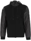C.p. Company Men Black Jacket With Drawstring Hood And Logo Plaque On The Sleeve In Wool Man In Black