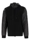 C.p. Company Men Black Jacket With Drawstring Hood And Logo Plaque On The Sleeve In Wool Man In Black
