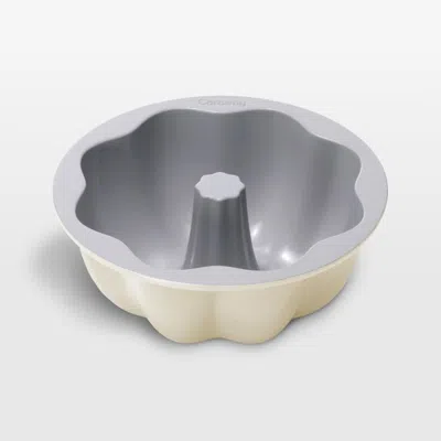 Crate & Barrel Caraway ® Cream 9.5" Ceramic Nonstick Fluted Cake Pan In White