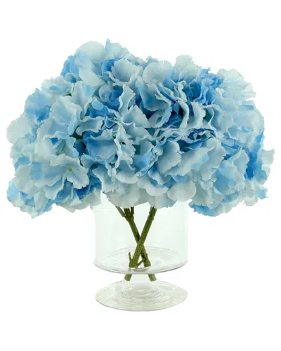 Creative Displays Blue Hydrangeas Arranged In A Clear Glass Vase