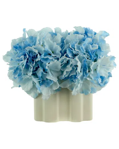 Creative Displays Blue Hydrangeas Arranged In A Decorative White Ceramic Vase