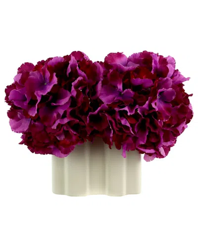 Creative Displays Purple Hydrangeas Arranged In A Decorative White Ceramic Vase