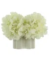 Creative Displays White Hydrangeas Arranged In A Decorative White Ceramic Vase In White