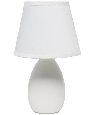 Creekwood Home Nauru 9.45" Traditional Petite Ceramic Oblong Bedside Table Desk Lamp With Tapered Drum Fabric Shade In Off White